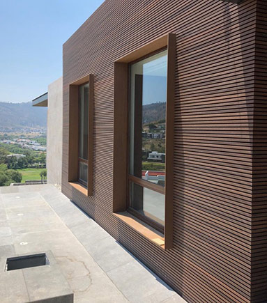Capped Composite Wall Cladding